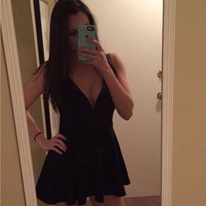 Mini black v-neck dress with built in shorts